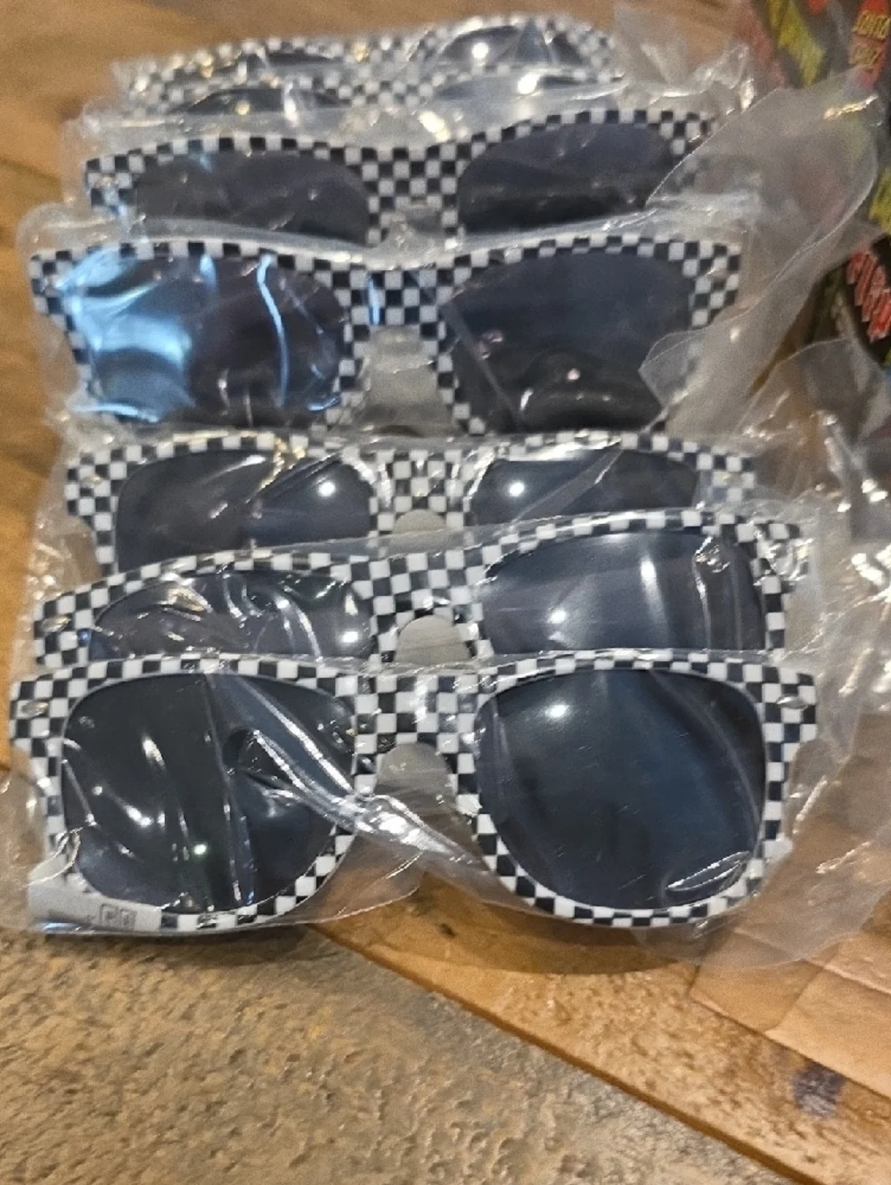Checkered Skateboard Party Sunglasses & Wristband Party Favor Bundle